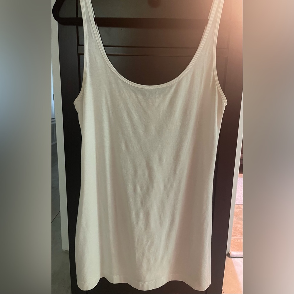 Lululemon white cotton tank top. No size tag but pretty sure it’s a size 8